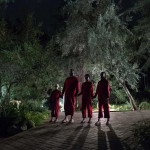 The Wilson family doppelgängers (from left), Pluto (Evan Alex), Abraham (Winston Duke), Umbrae (Shahadi Wright Jospeh) and Red (Lupita Nyong’o) in Us, written, produced and directed by Jordan Peele. 
Photo Credit: Claudette Barius/Universal Pictures Us_2511_D014_00065